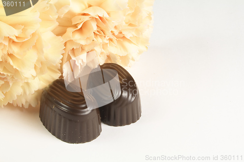 Image of chocolates and carnations