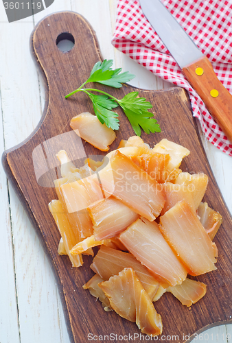 Image of smoked fish on board