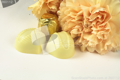 Image of chocolates and carnations