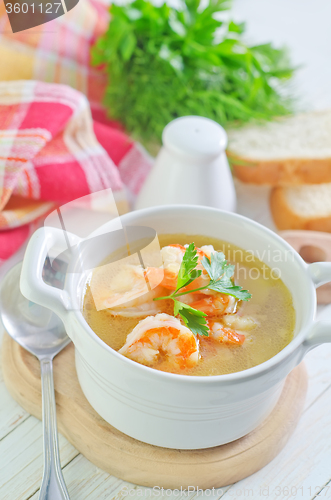 Image of fresh soup with chicken and shrimps