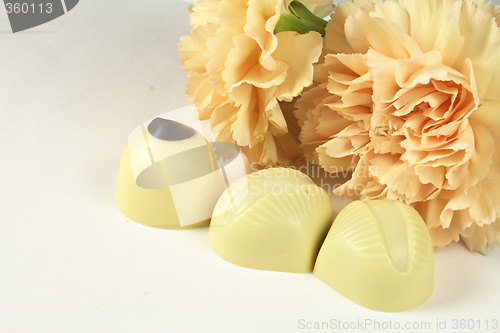 Image of chocolates and carnations