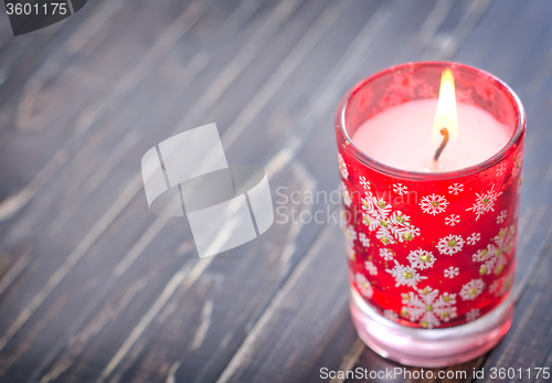 Image of candle and christmas decoration