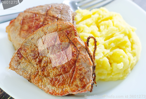 Image of mashed potato and fried meat