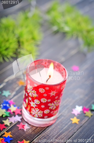 Image of candle and christmas decoration