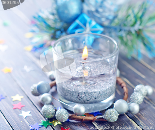 Image of candle and christmas decoration