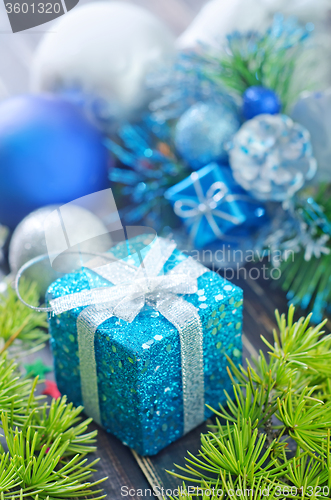 Image of christmas decoration on wooden background