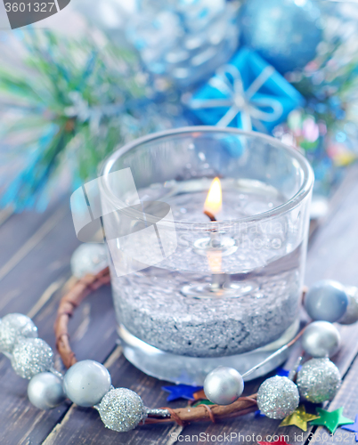 Image of candle and christmas decoration