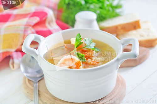 Image of fresh soup with chicken and shrimps