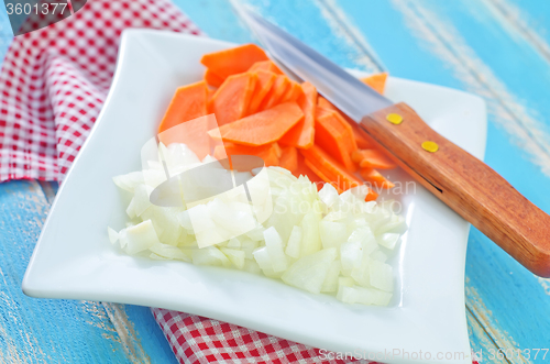 Image of raw carrot and onion