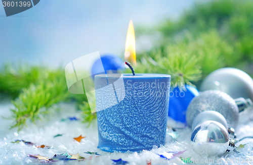 Image of candle and christmas decoration