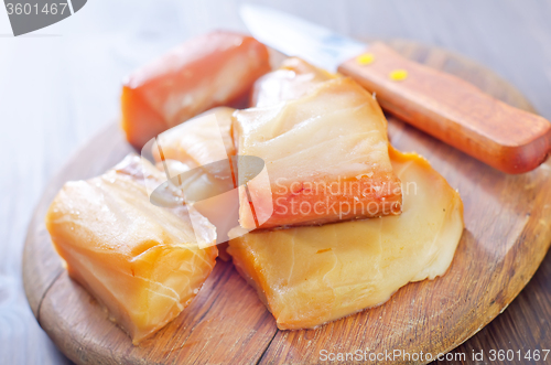 Image of smoked fish on board