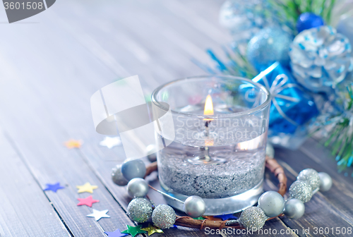 Image of candle and christmas decoration