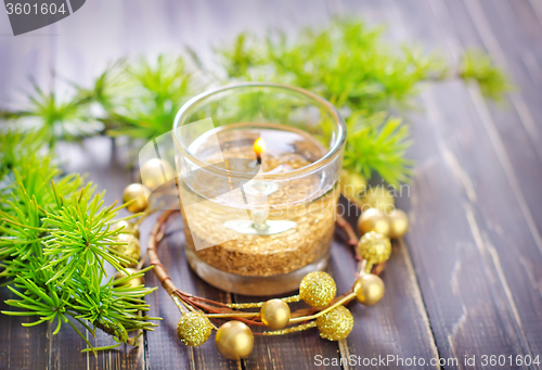 Image of candle and christmas decoration