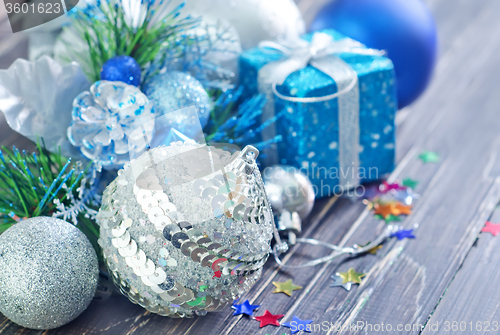 Image of christmas decoration on wooden background