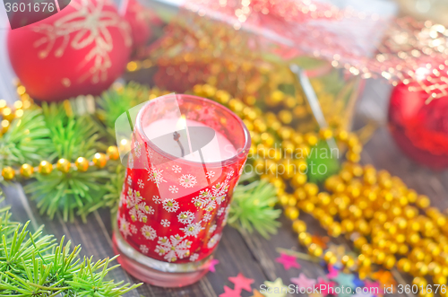 Image of candle and christmas decoration