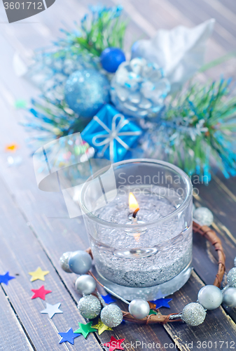 Image of candle and christmas decoration
