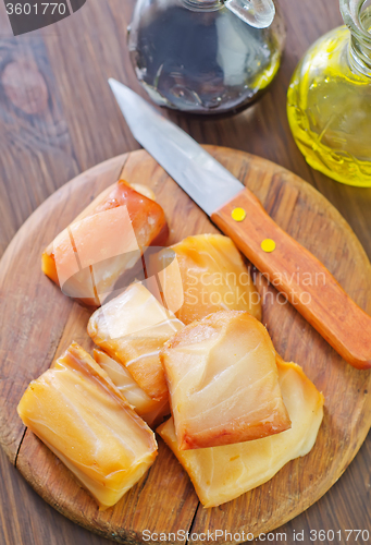 Image of smoked fish on board