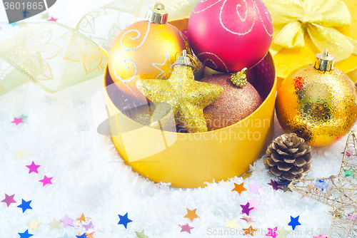 Image of christmas decoration and box for present