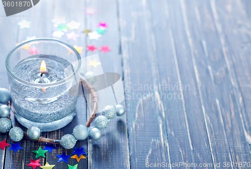 Image of candle and christmas decoration