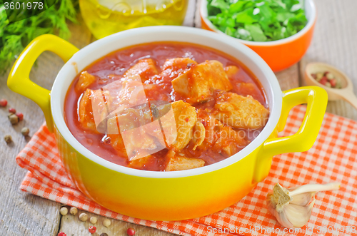 Image of chicken with tomato sauce