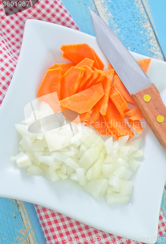 Image of raw carrot and onion