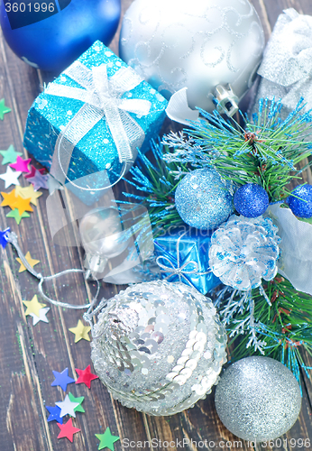 Image of christmas decoration on wooden background