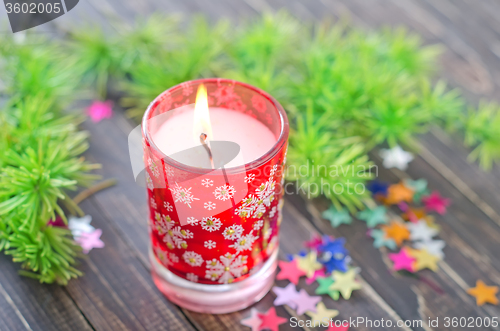 Image of candle and christmas decoration