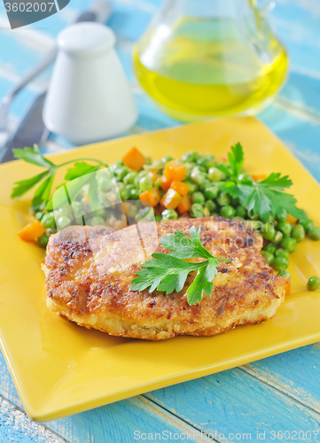 Image of chicken breast and green peas