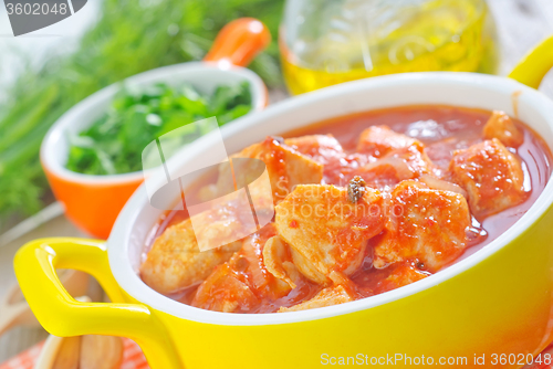 Image of chicken with tomato sauce