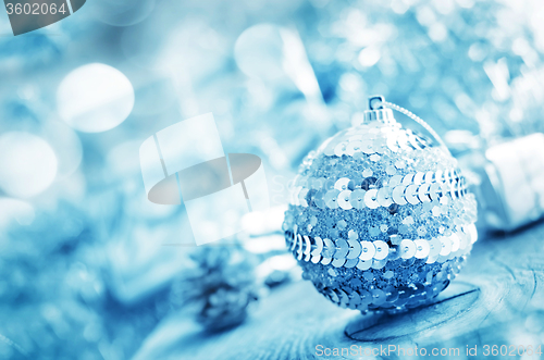 Image of silver ball and other cristmas decoration.