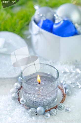 Image of candle and christmas decoration