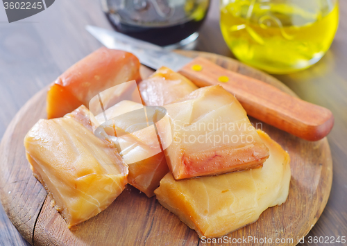 Image of smoked fish on board