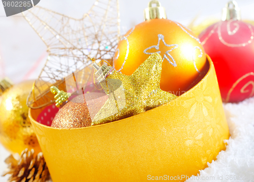 Image of christmas decoration and box for present