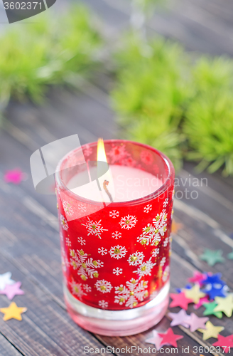 Image of candle and christmas decoration