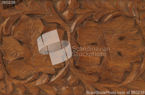 Image of Leaves engraved on wood