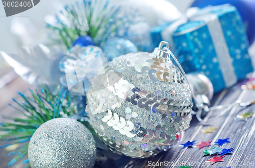 Image of christmas decoration on wooden background