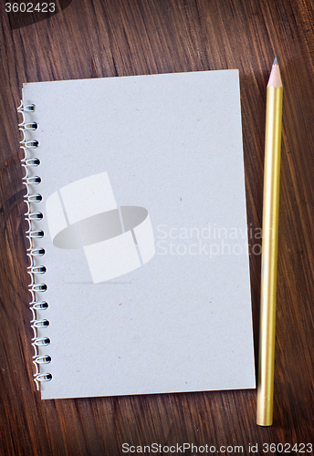 Image of note and pencil