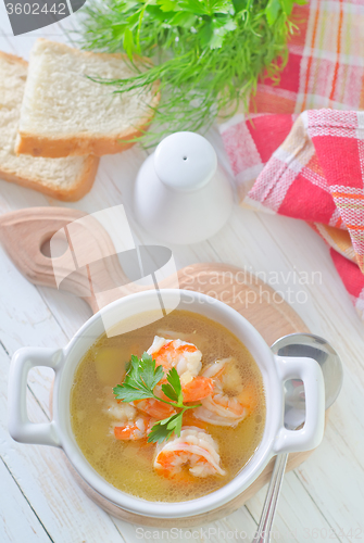 Image of fresh soup with chicken and shrimps
