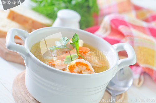 Image of fresh soup with chicken and shrimps