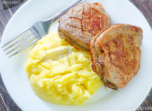 Image of mashed potato and fried meat