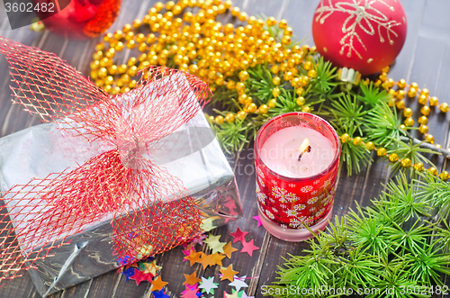 Image of candle and christmas decoration