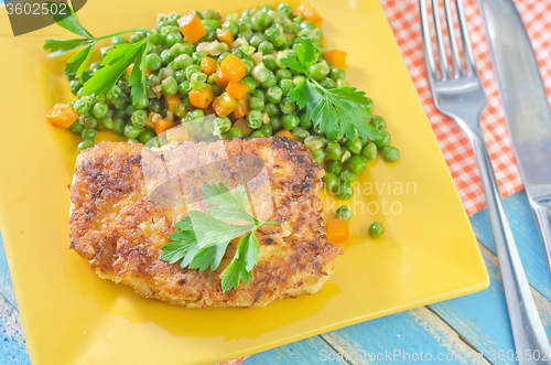 Image of chicken breast and green peas
