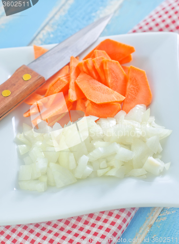 Image of raw carrot and onion