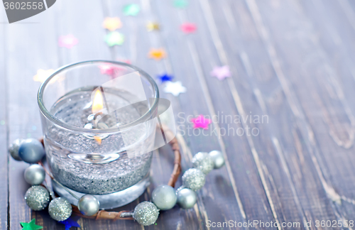 Image of candle and christmas decoration