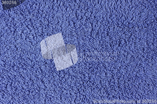 Image of Slighty worn purple towel