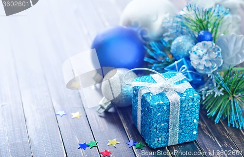 Image of christmas decoration on wooden background