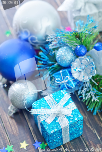 Image of christmas decoration on wooden background
