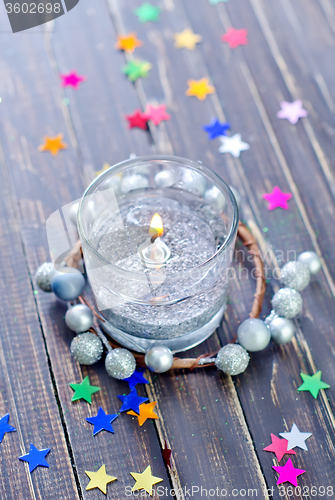 Image of candle and christmas decoration