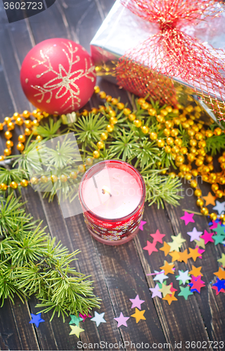 Image of candle and christmas decoration