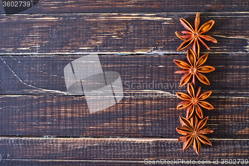 Image of anise on wooden board